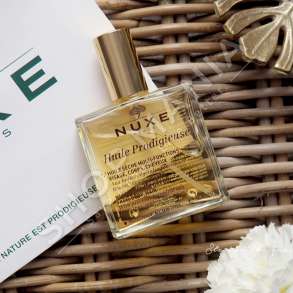 NUXE - VAJ MULTI-FUNKSIONAL HIDRATUES, USHQYES & ZBUTES PER FLOKET, FYTYREN & TRUPIN "HULIE PRODIGIEUSE - 100ML